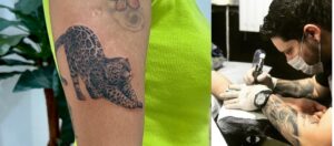 Tatuagem de onça realista no braço na Tijuca feita por Ricardo Marinho. Conheça o significado e agende sua tattoo no RJ.