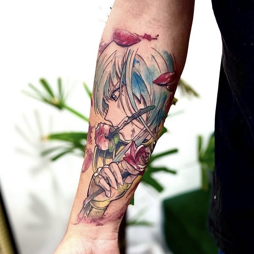 Tatuagem colorida de personagem de anime no antebraço por Ricardo Marinho